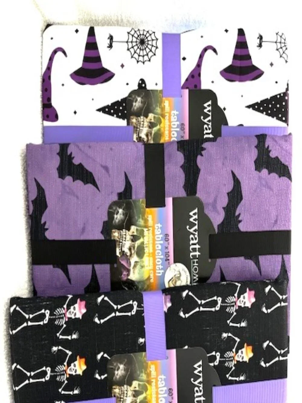 Three different Halloween themed, spill resistant, easy care tablecloths NWT